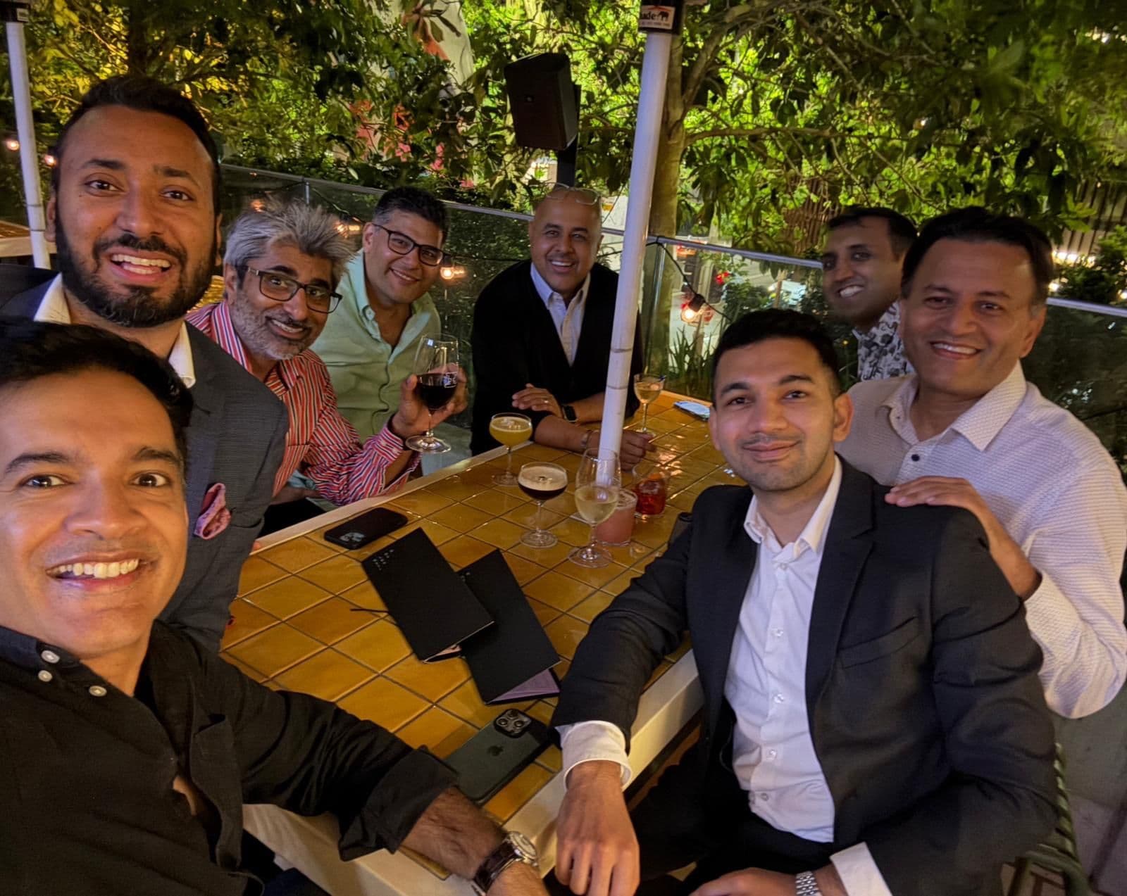 Sub-continent professionals networking at community gathering