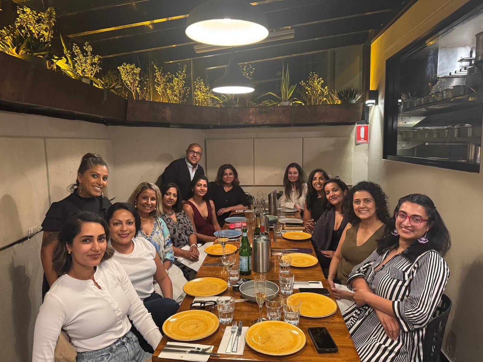 Desi professionals dining together at community event